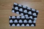 Pannebånd , sort med hvite elefanter.jpg
